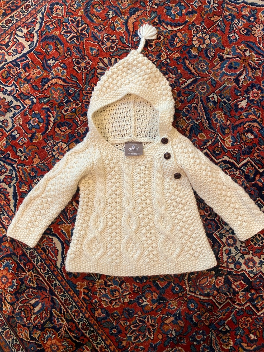 NWOT Aran 100% merino wool Hooded Cable Knit Baby Pullover with Side Buttons